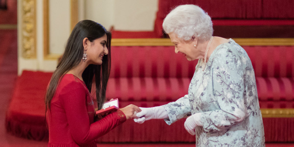 Suhani Jalota receiving the Queen’s Young Leader award from Queen Elizabeth II